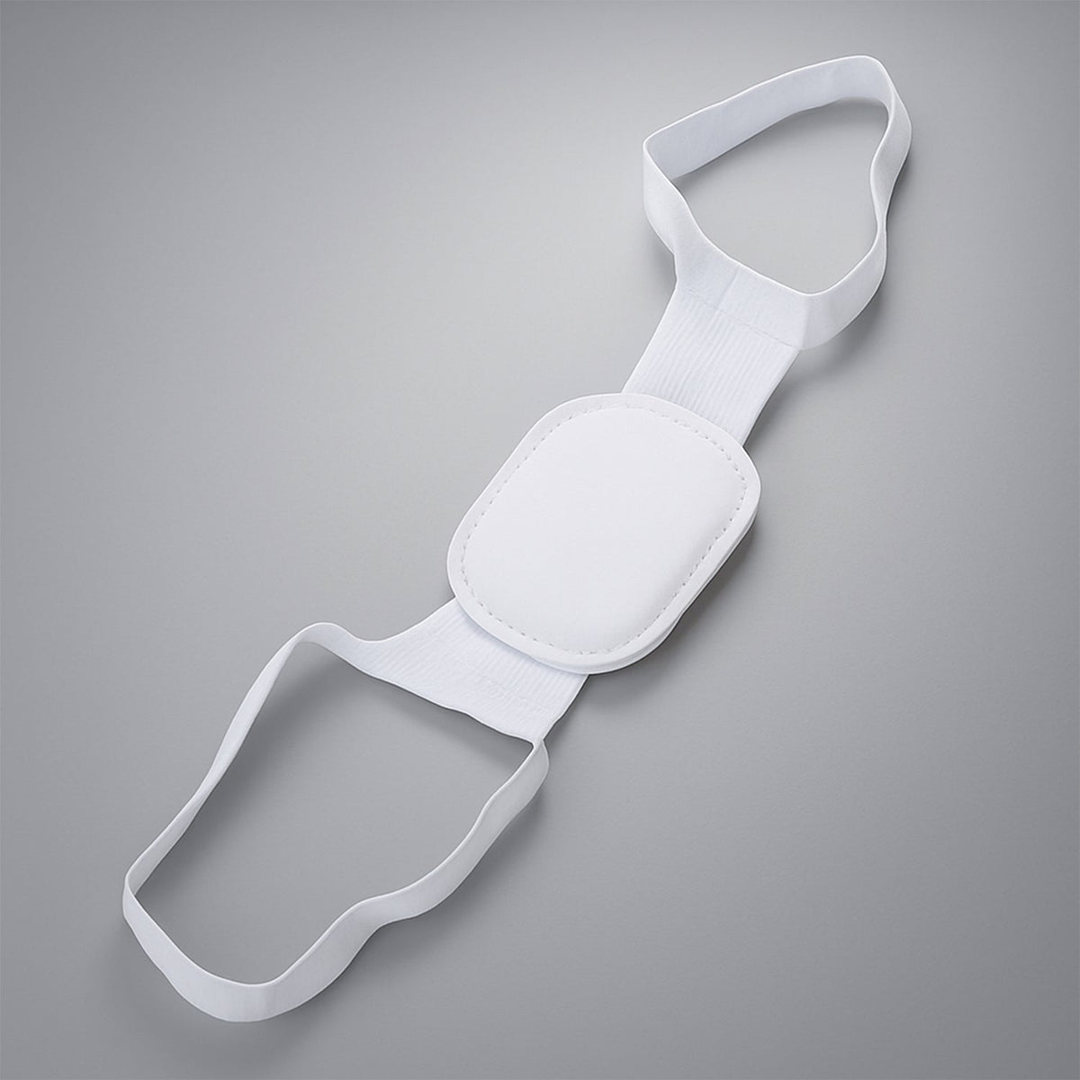 Image showing the posture corrector being worn discreetly under clothing for everyday use.